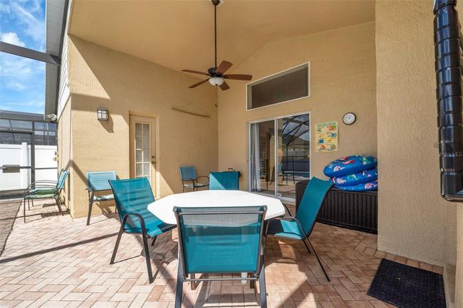 Brick pavers cover the pool deck | Image 7