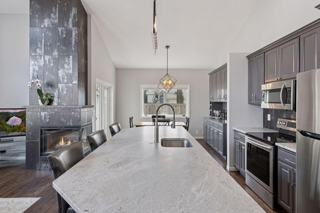 Stunning design elements in the recently updated main living areas of this well-maintained townhome | Image 5