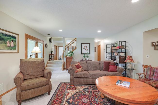 Looking back to the staircase, bedrooms and storage area. | Image 35