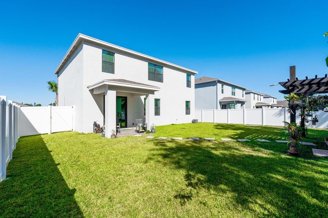 5850 Se Sky Blue Circle, House other with 5 bedrooms, 3 bathrooms and null parking in Stuart FL | Image 28