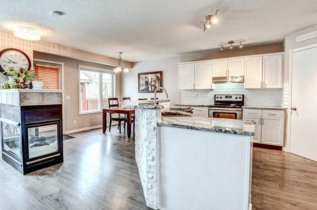 116 Bridlewood Circle Sw, Home with 3 bedrooms, 3 bathrooms and 4 parking in Calgary AB | Image 3