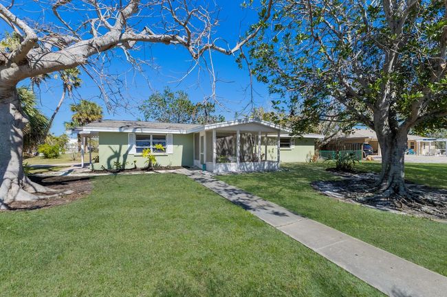 The property beckons from either street with the private walkway. | Image 22