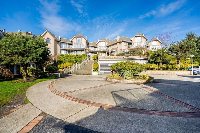 View of community with stairway, a residential view, and driveway | Image 35