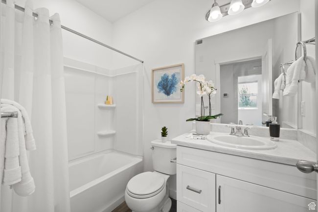Bathroom with shower / tub combo and vanity | Image 19