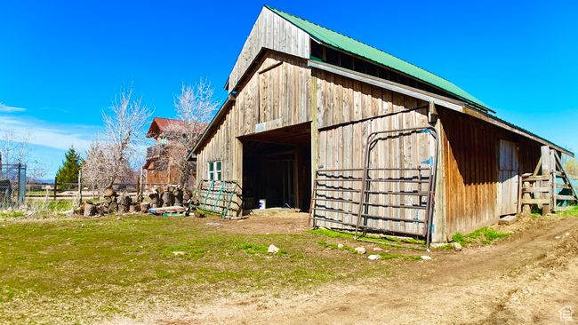 View of barn with fence | Image 32