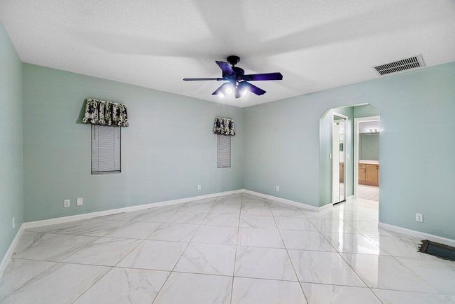 61 W Rubber Tree Dr, House other with 3 bedrooms, 2 bathrooms and null parking in Lake Worth FL | Image 16