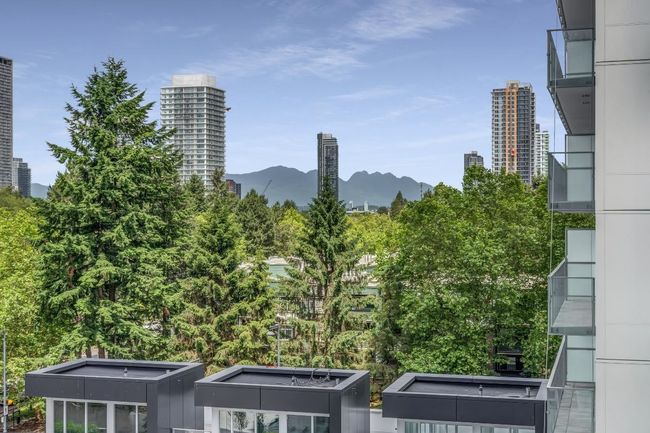 View of city with mountains | Image 18