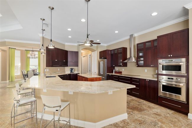 Notice flow of floor plan with dining room accessible to kitchen from entrance in the background | Image 38
