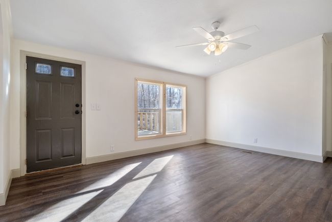 New windows throughout the house brings in lots of light and energy efficiency. | Image 7