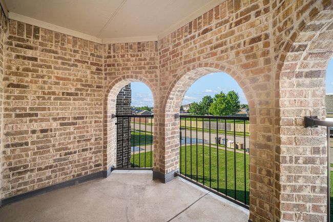 View of patio featuring a balcony | Image 35