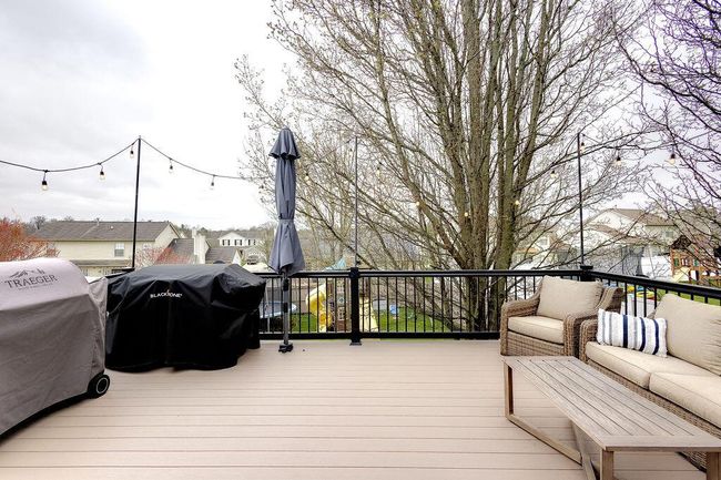 New composite deck overlooking back yard. | Image 44