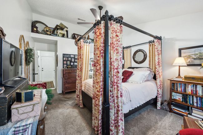 Bedroom with carpet flooring and a ceiling fan | Image 18