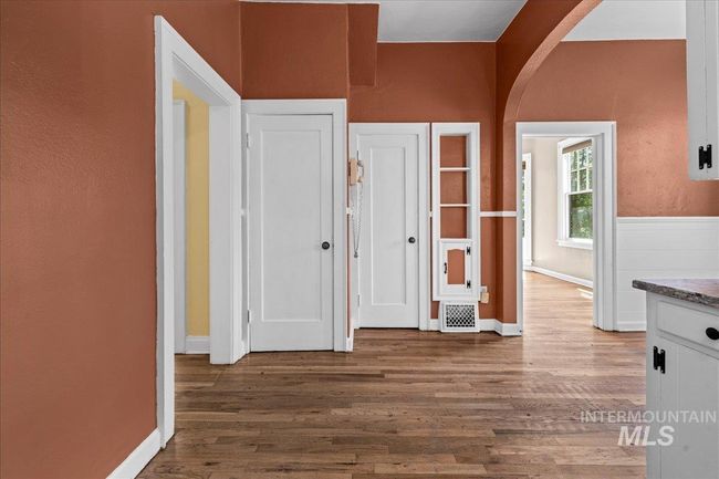 arched walkways and wood finished floors | Image 17