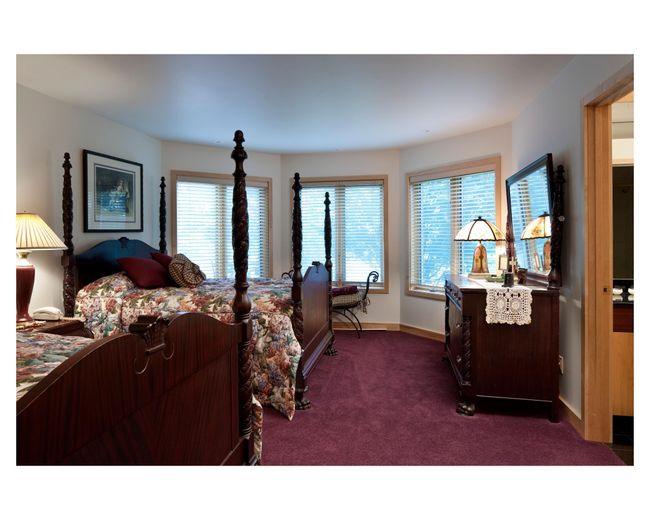 This is one of two bedrooms in the lower level of the Mary Hill Lodge, with views of the lake | Image 64
