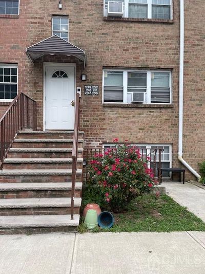 247-247 College Drive, Townhouse with 2 bedrooms, 1 bathrooms and null parking in Edison NJ | Image 1