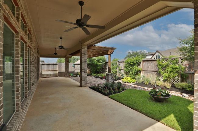 View of Covered Patio and Gazebo with Beautiful Landscaping. | Image 26