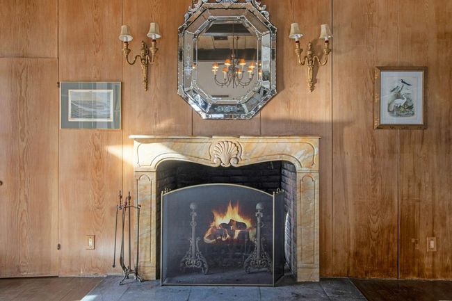 Room details with wood walls | Image 15