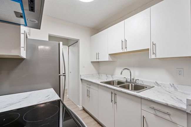 227 - 2600 E 49 Th Avenue, Condo with 2 bedrooms, 1 bathrooms and 1 parking in Vancouver BC | Image 12