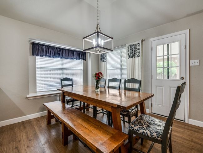 Dining space with decorative lighting | Image 6