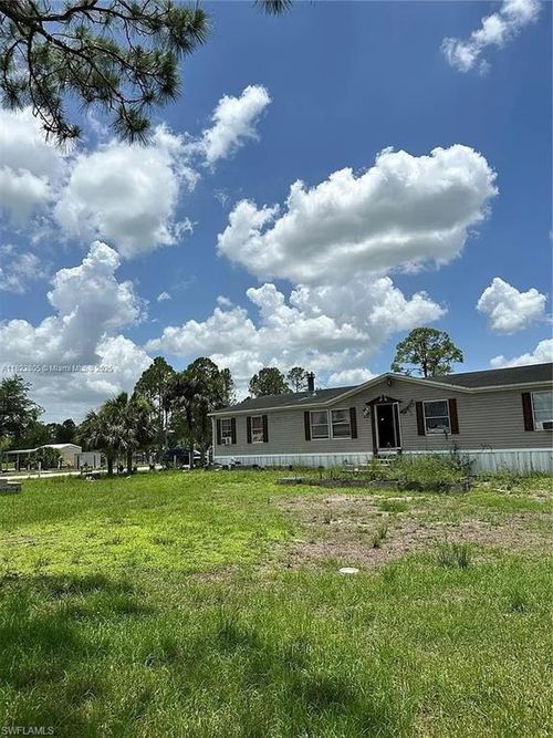 618 Hunting Club Ave, Clewiston, FL, 33440-8853 | Card Image
