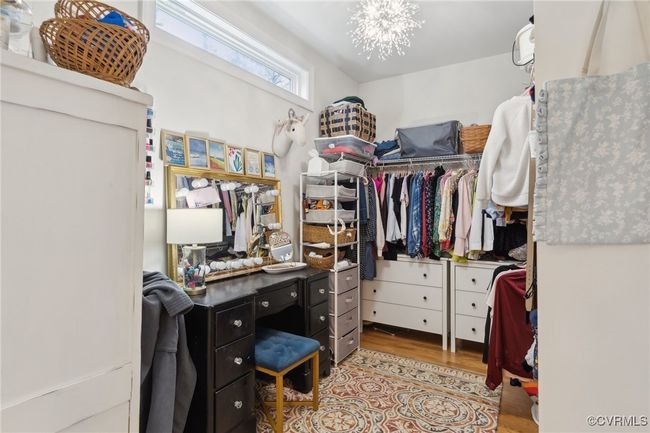 Spacious closet featuring wood finished floors | Image 24