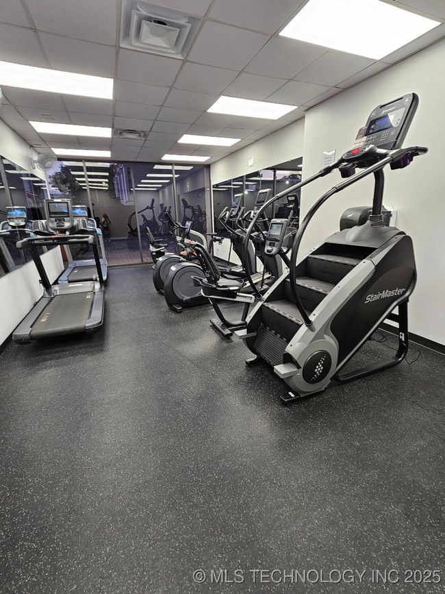 Cadio Section of Gym; Sauna Located in Gym | Image 25