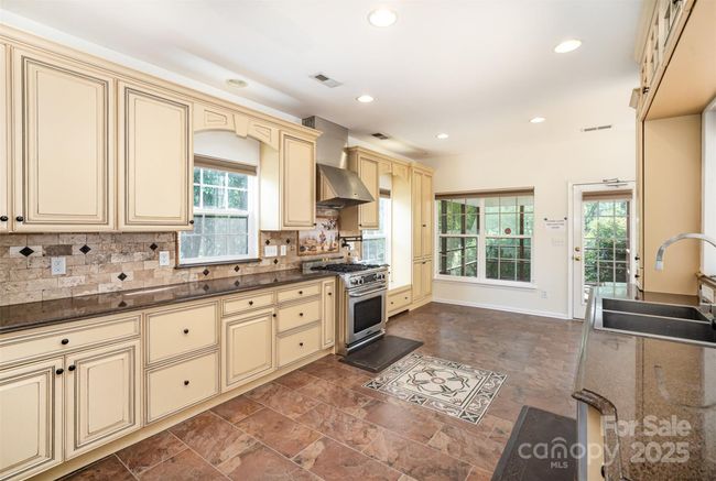 1801 Briarcrest Dr Nw, House other with 5 bedrooms, 3 bathrooms and null parking in Charlotte NC | Image 14
