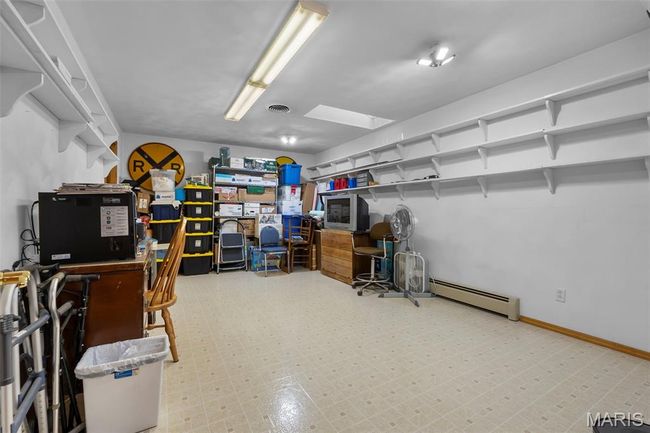 Office with baseboard heating | Image 81