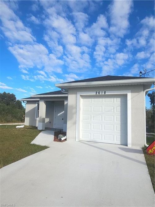 2618 25th St W, Lehigh Acres, FL, 33971-5599 | Card Image