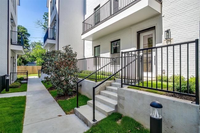 View of property's community featuring fence | Image 31