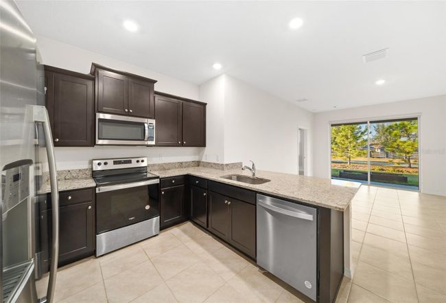 8051 Penrose Place, House other with 3 bedrooms, 2 bathrooms and null parking in Wildwood FL | Image 35