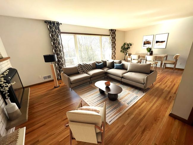 Informal dining area can expand to include hardwood floor area. | Image 9