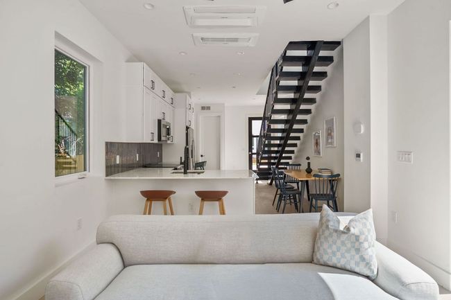 Living room featuring stairway | Image 6