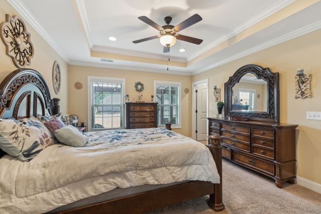 The en-suite bathroom completes the space, offering both luxury and convenience. 1107 Sycamore Leaf Way Murfreesboro, TN 37129 | Image 18