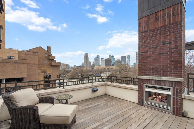 Private rooftop deck with gas fireplace & connected to the home sound system | Image 47