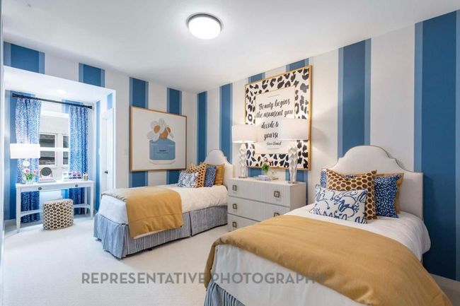 Bedroom featuring wallpapered walls and carpet | Image 26