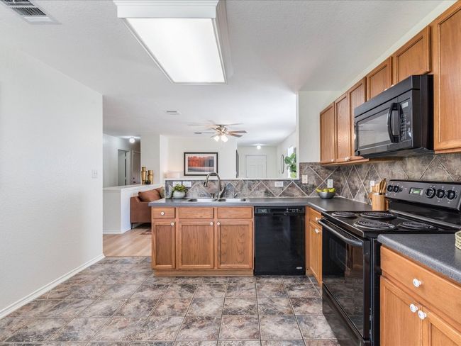 The kitchen comes ready to use until you are ready to take it to the next level with your ideal modern upgrades. | Image 14