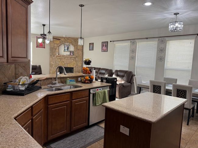 View of kitchen with great center island, and a lot of space to enjoy. | Image 21