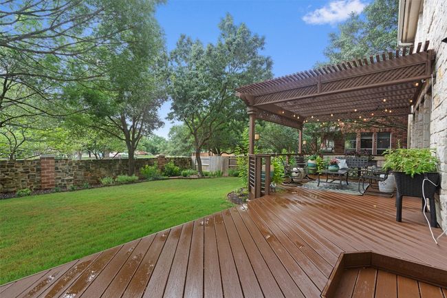 Wooden deck featuring a pergola | Image 32