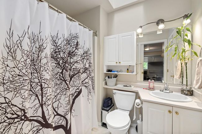 UP STAIRS ON MAIN FLOOR BATHROOM 4 PC TUB/SHOWER/SINK/TOILET SKY LIGHT | Image 15