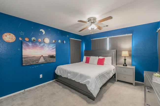 Bedroom featuring carpet floors and ceiling fan | Image 26