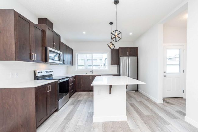 508 Legacy Circle Se, Home with 4 bedrooms, 3 bathrooms and 2 parking in Calgary AB | Image 8