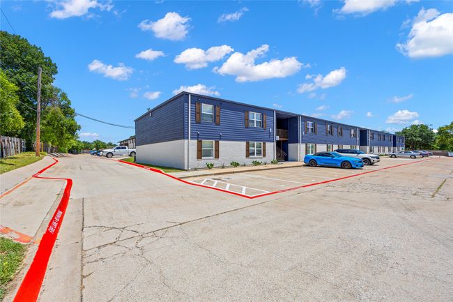 View of property with uncovered parking | Image 7