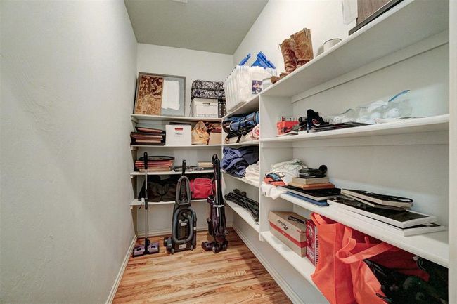 Large hall storage area with built-in shelves | Image 21