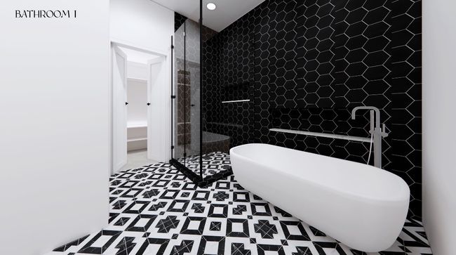 Bathroom featuring tile walls, a freestanding tub, and a stall shower | Image 5