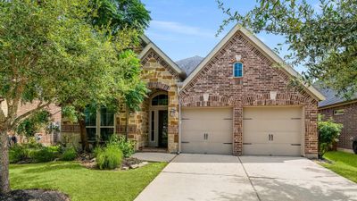 The spacious two-car garage offers both convenience and ample storage, perfectly complementing the home's design. | Image 1