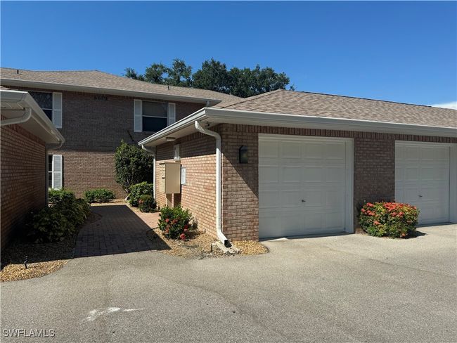 View of front of home featuring a garage | Image 29