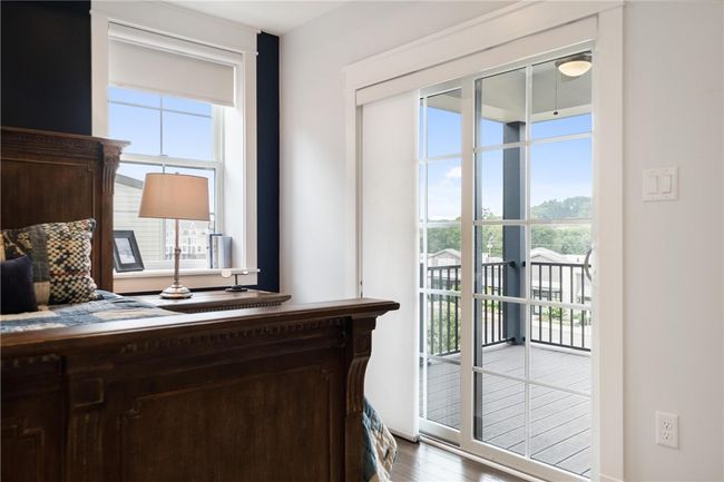 Owner's Suite sliding door to private covered deck. | Image 21