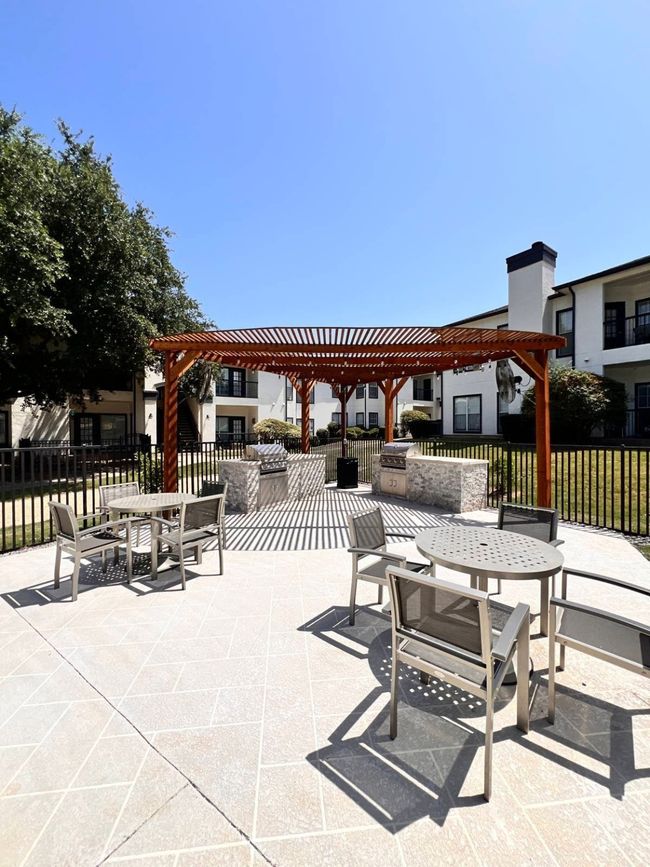 View of patio with a pergola | Image 7