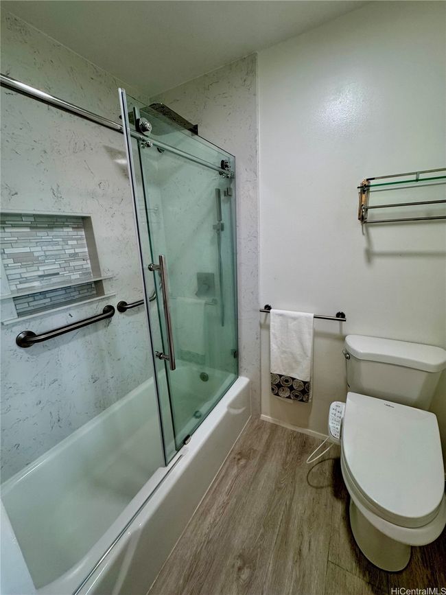 Hall bathroom with a full size tub | Image 21